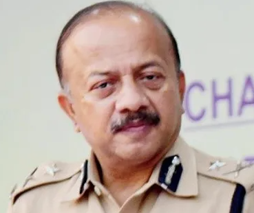 Close portrait of Deven Bharti, IPS, in Mumbai Police uniform.