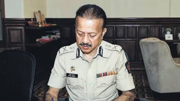 Deven Bharti at work at the Commissioner of Police desk.